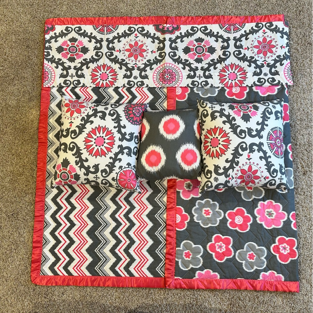 Reversible quilt, valance, and 3 pillows. Handmade ordered from Etsy.